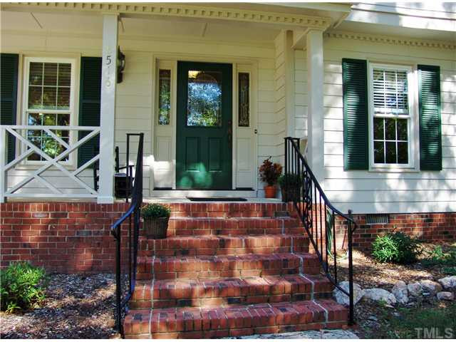 8516 Shadow Wood Place Raleigh, NC 27613 - Photo 3 of 25 Notice the leaded glass insulated front door and side lights and the new wrought iron railings! Porch