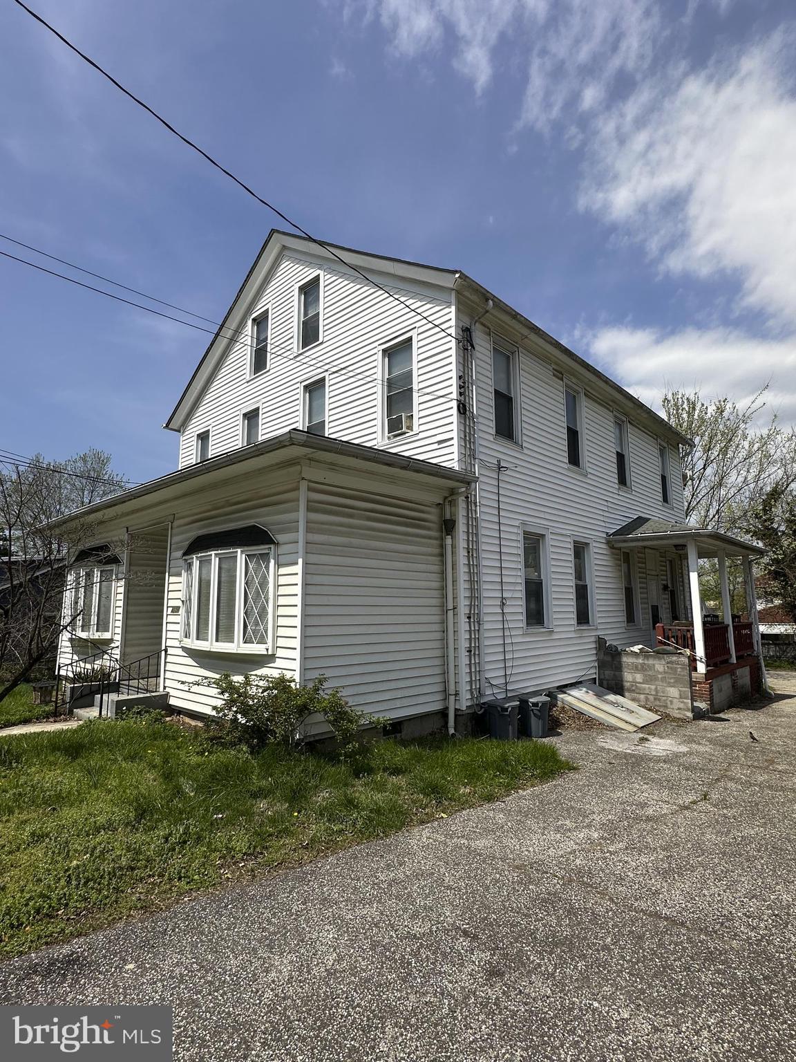 4606 Ridge Avenue Halethorpe, MD 21227 - Photo 2 of 24 a front view of a house with garden