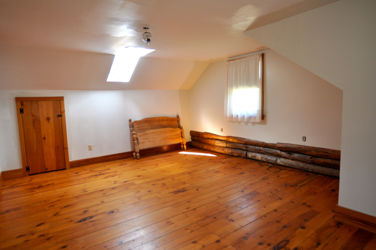 401 Polikoff Road Sheffield, MA 01222 - Photo 13 of 17 a view of a room with wooden floor and window