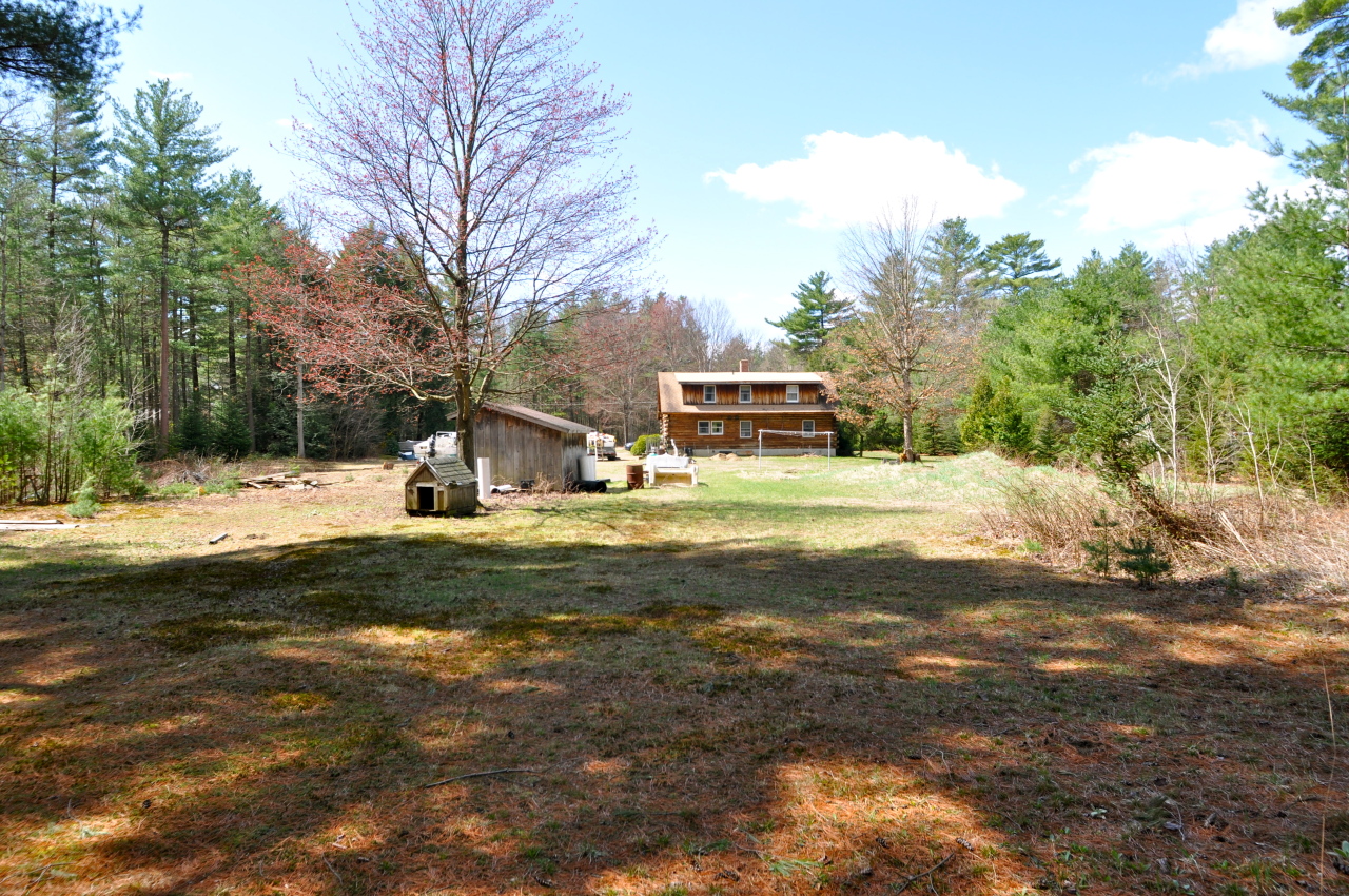 401 Polikoff Road Sheffield, MA 01222 - Photo 17 of 17 a view of a house with a yard