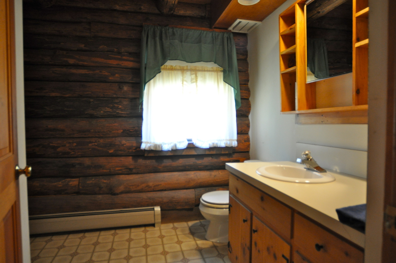 401 Polikoff Road Sheffield, MA 01222 - Photo 9 of 17 a bathroom with a sink and a mirror