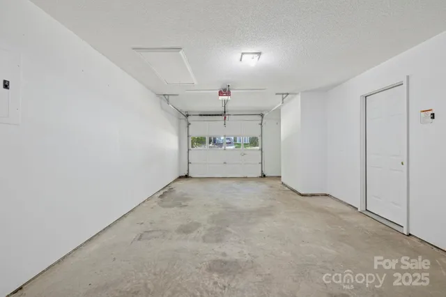 a view of livingroom with washer and dryer
