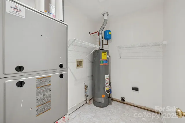 a view of house with a yard