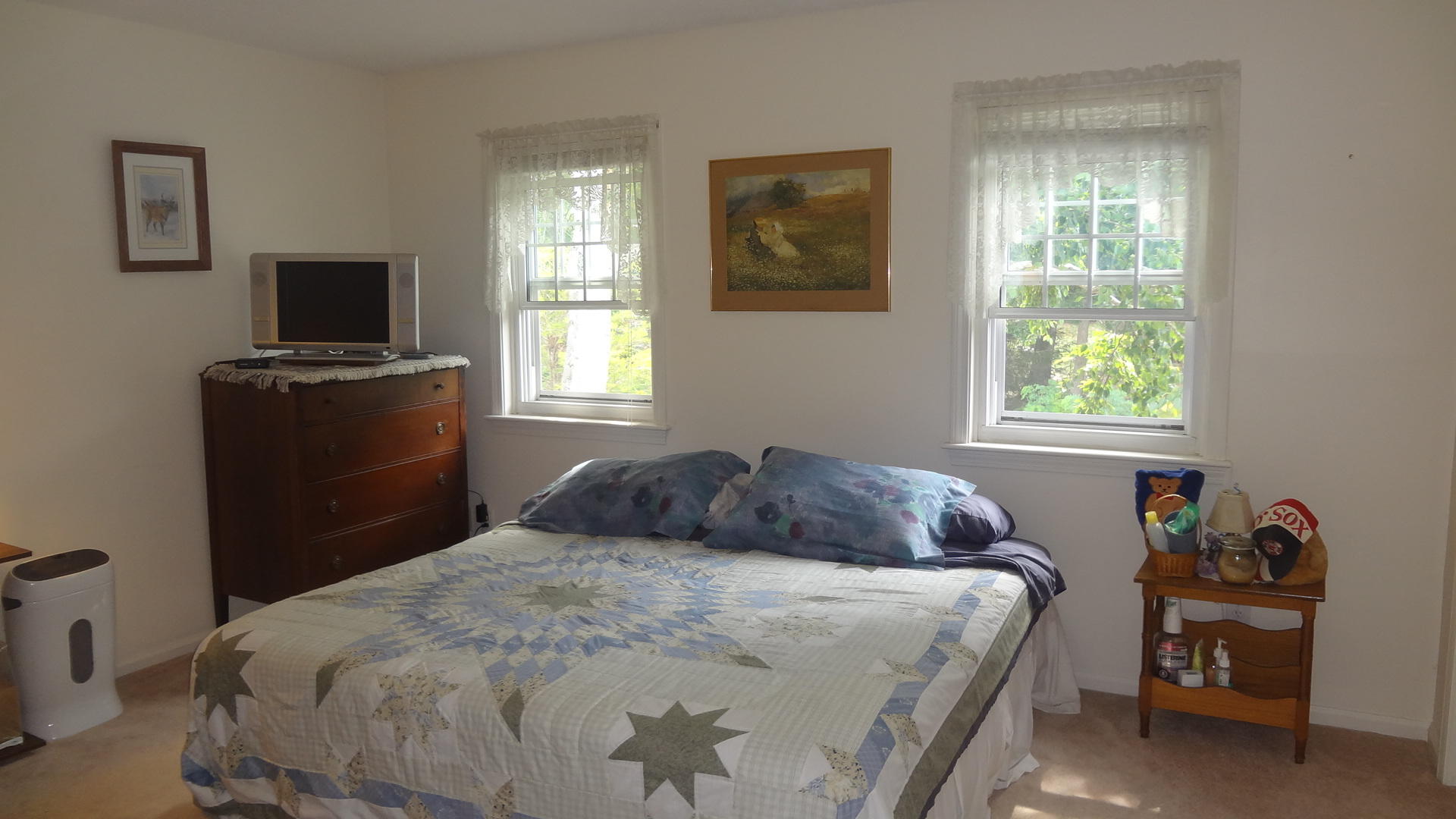 683 Old Post (rt 6a Main St ) Road, Unit 16 Dennis, MA 02638 - Photo 17 of 23 a bedroom with a bed and a window
