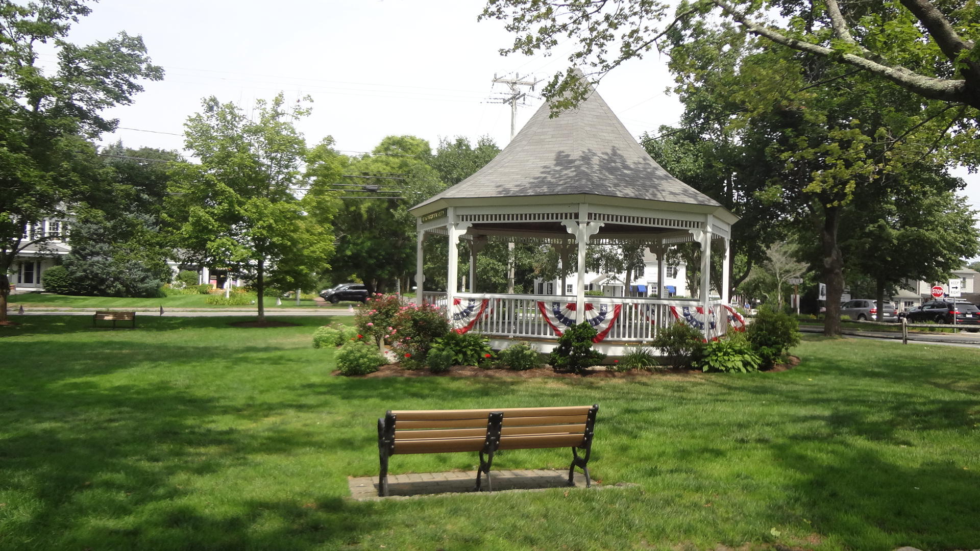 683 Old Post (rt 6a Main St ) Road, Unit 16 Dennis, MA 02638 - Photo 20 of 23 a front view of a house with garden and trees