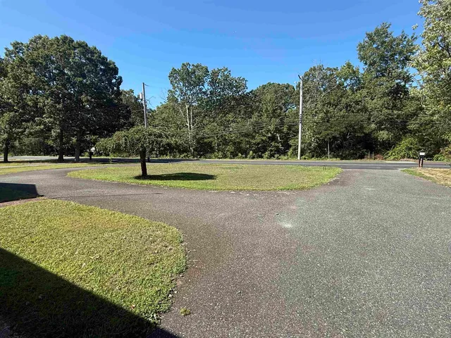 a view of a golf course with a yard