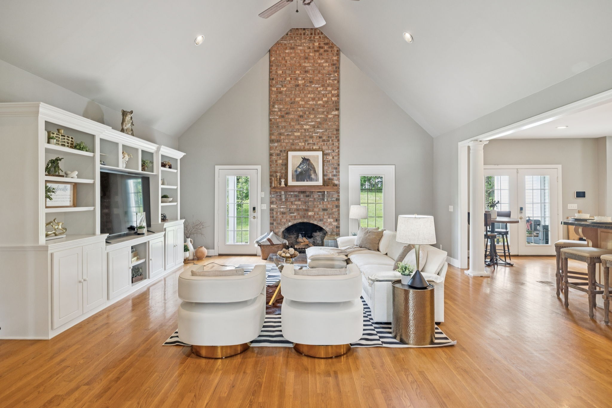 1387 Floyd Road Eagleville, TN 37060 - Photo 18 of 100 a living room with furniture a flat screen tv and a fireplace