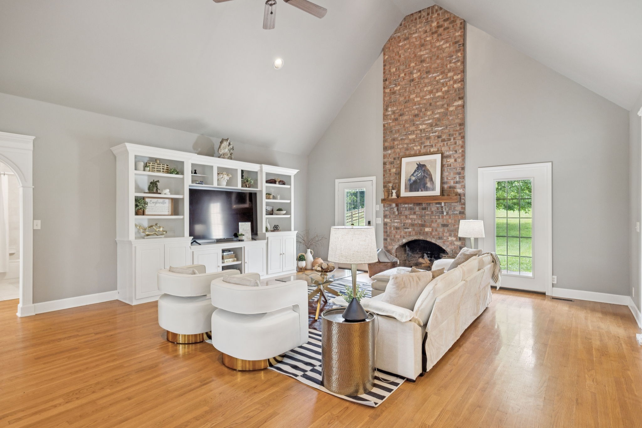 1387 Floyd Road Eagleville, TN 37060 - Photo 19 of 100 a living room with fireplace furniture and a wooden floor