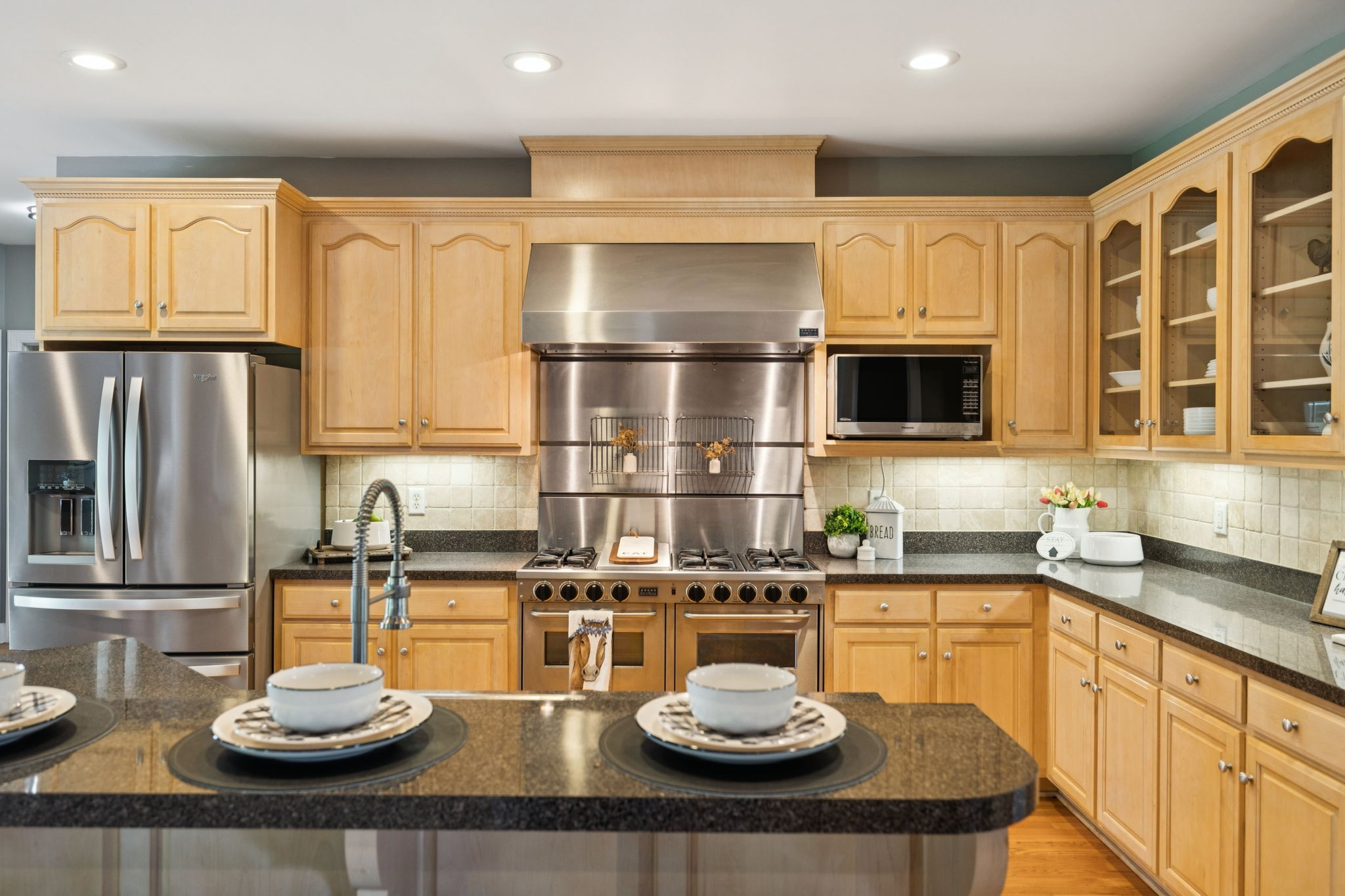 1387 Floyd Road Eagleville, TN 37060 - Photo 33 of 100 a kitchen with a sink a stove and chairs