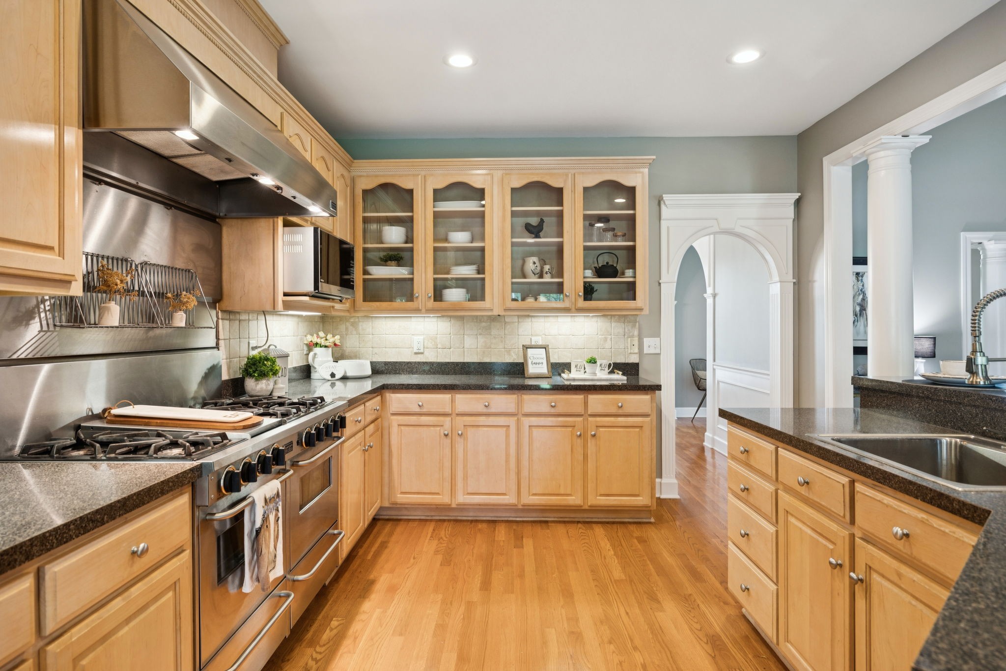 1387 Floyd Road Eagleville, TN 37060 - Photo 36 of 100 a kitchen with stainless steel appliances granite countertop a stove and a sink