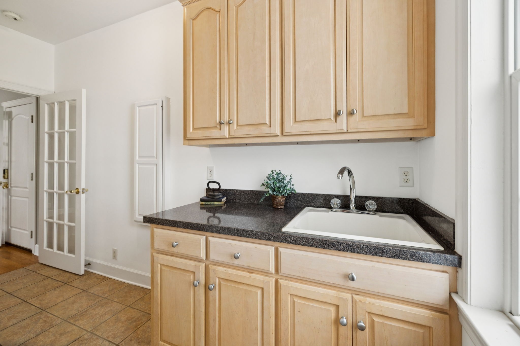 1387 Floyd Road Eagleville, TN 37060 - Photo 54 of 100 a kitchen with white cabinets and sink