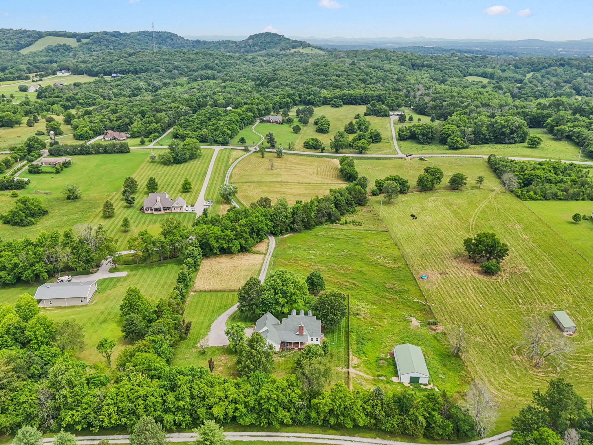 1387 Floyd Road Eagleville, TN 37060 - Photo 75 of 100 an aerial view of residential houses with outdoor space and trees