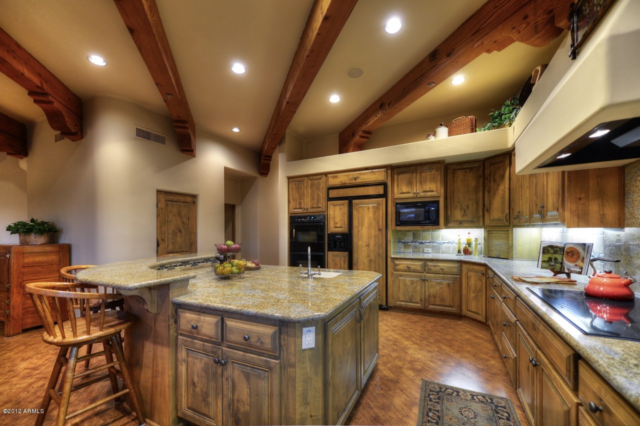 10040 East Happy Valley Road, Unit 431 Scottsdale, AZ 85255 - Photo 9 of 33 Kitchen Island