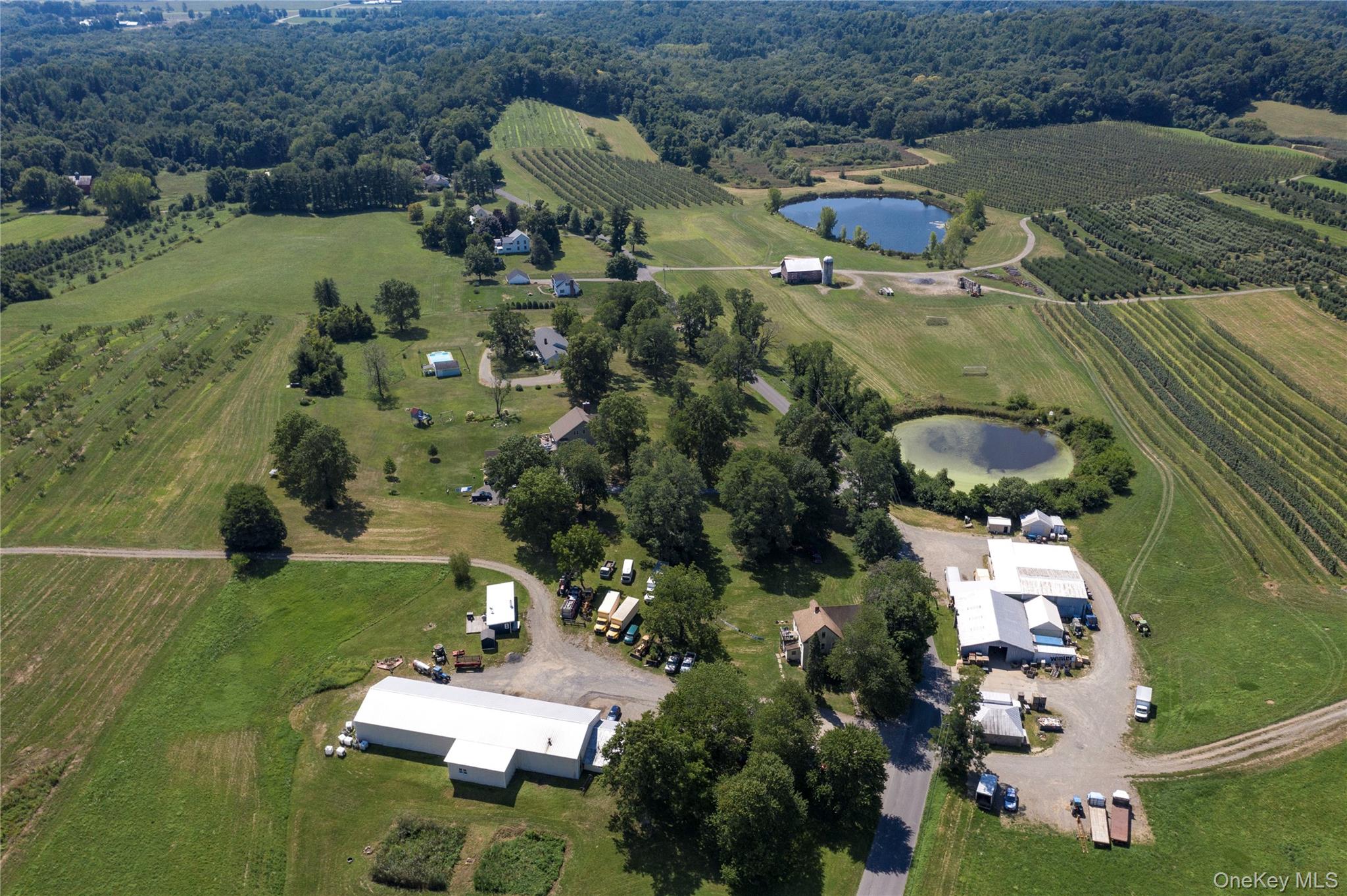 245 Guski Road Red Hook, NY 12571 - Photo 2 of 11 an aerial view of a house with a yard