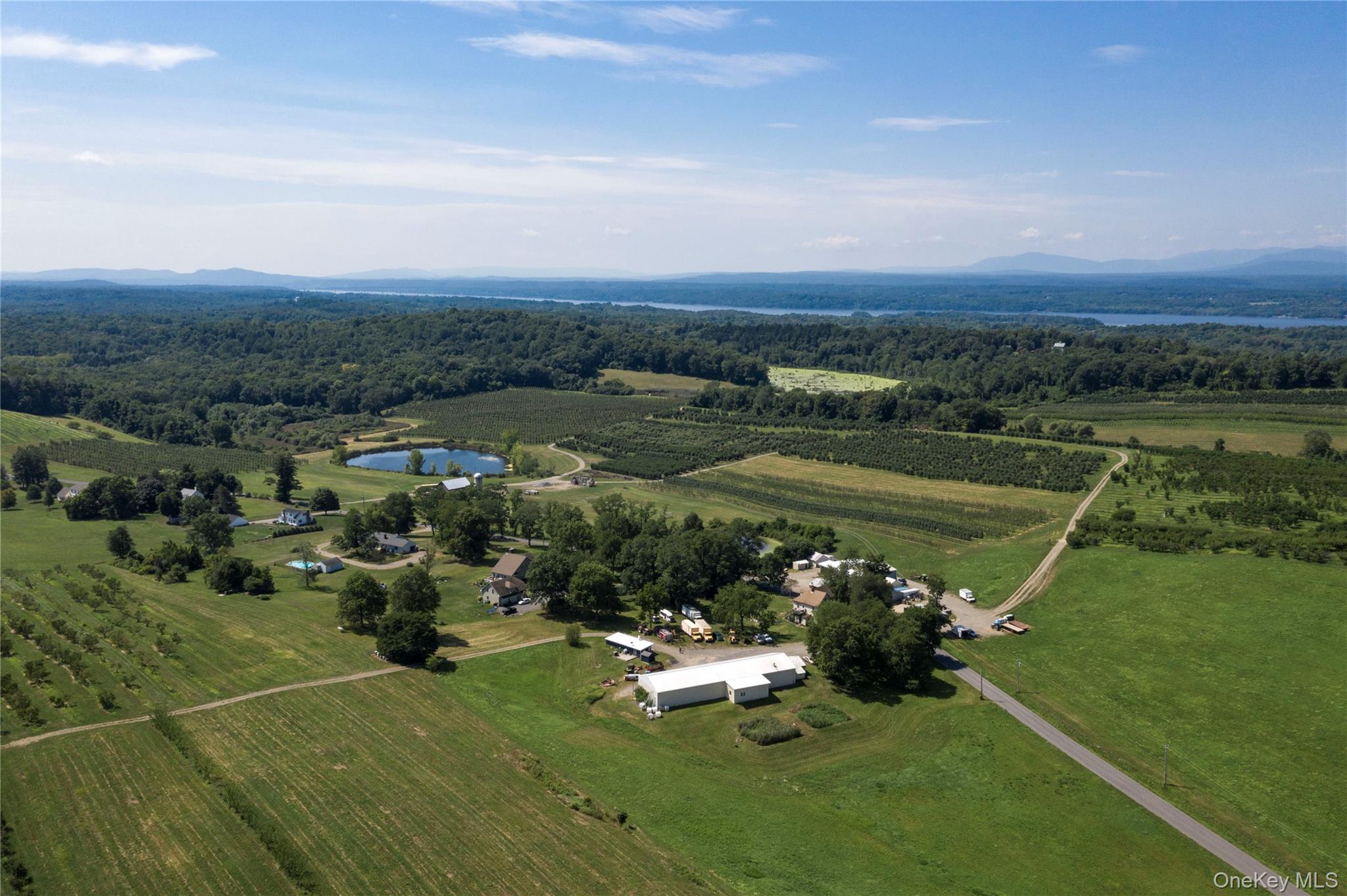 245 Guski Road Red Hook, NY 12571 - Photo 8 of 11 an aerial view of a town with residential houses