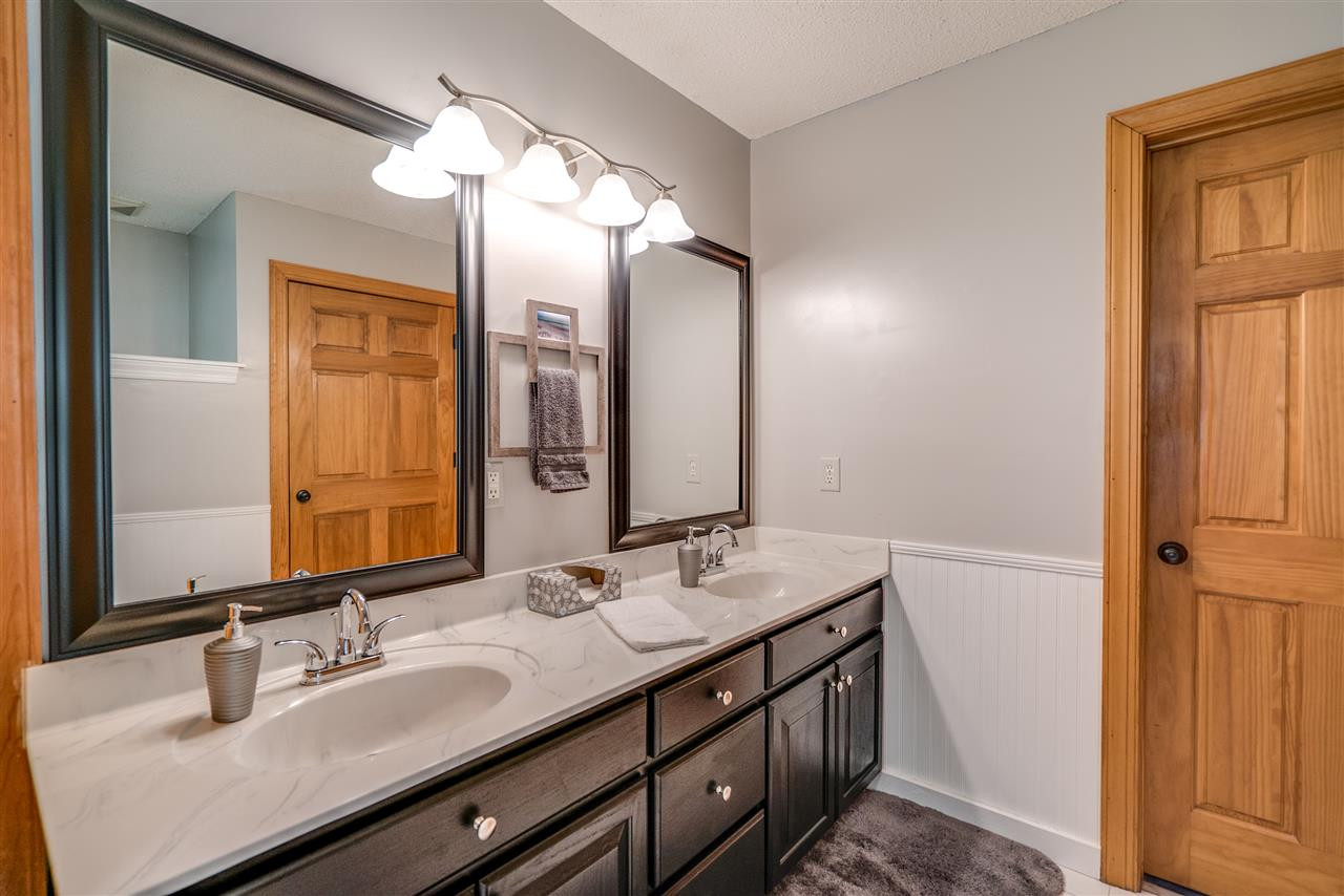 12200 Galway Drive Raleigh, NC 27613 - Photo 13 of 25 master bath