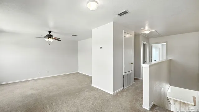 wooden floor in an empty room and a window