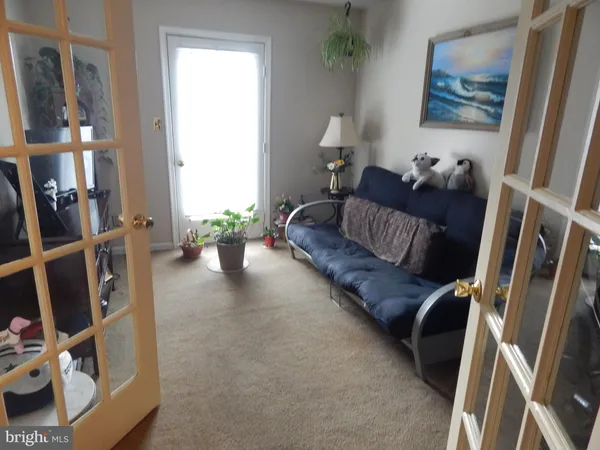a living room with furniture and a couch