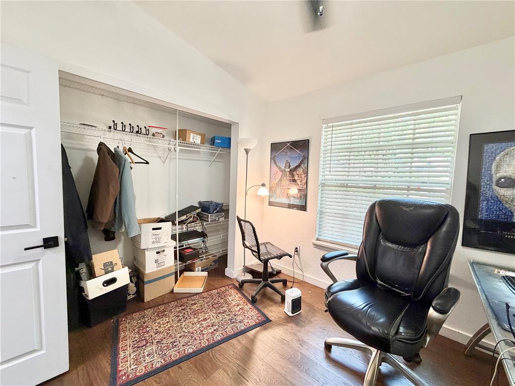 421 Northwest 48th Boulevard Gainesville, FL 32607 - Photo 13 of 26 a living room with furniture and a flat screen tv