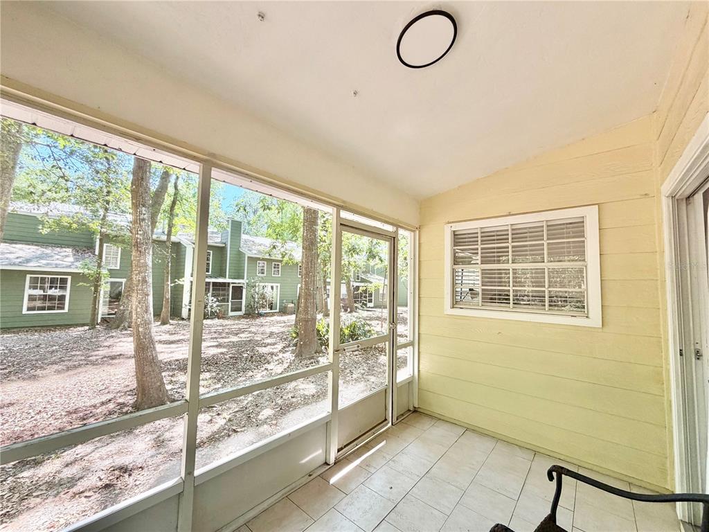 421 Northwest 48th Boulevard Gainesville, FL 32607 - Photo 17 of 26 a view of an empty room with a window