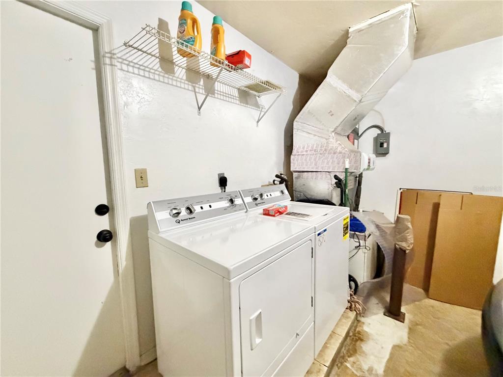 421 Northwest 48th Boulevard Gainesville, FL 32607 - Photo 18 of 26 a utility room with dryer and washer