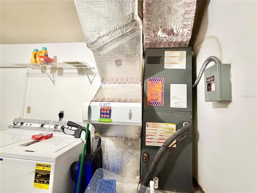 421 Northwest 48th Boulevard Gainesville, FL 32607 - Photo 19 of 26 a utility room with dryer and washer