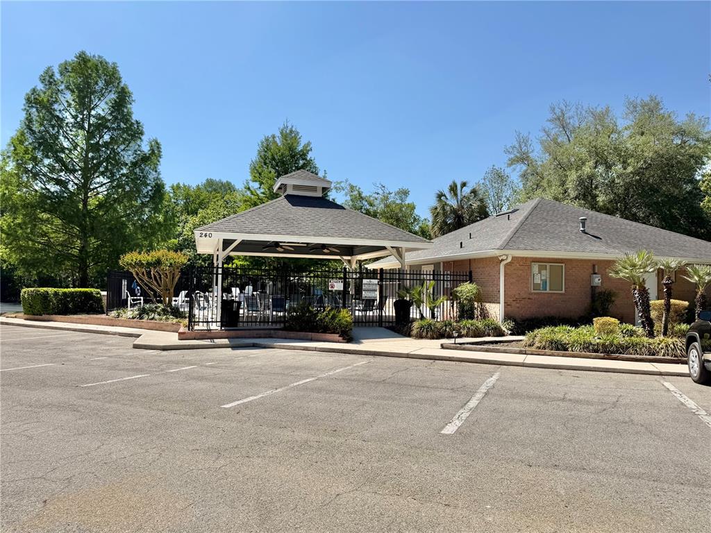 421 Northwest 48th Boulevard Gainesville, FL 32607 - Photo 22 of 26 a front view of a house with a porch