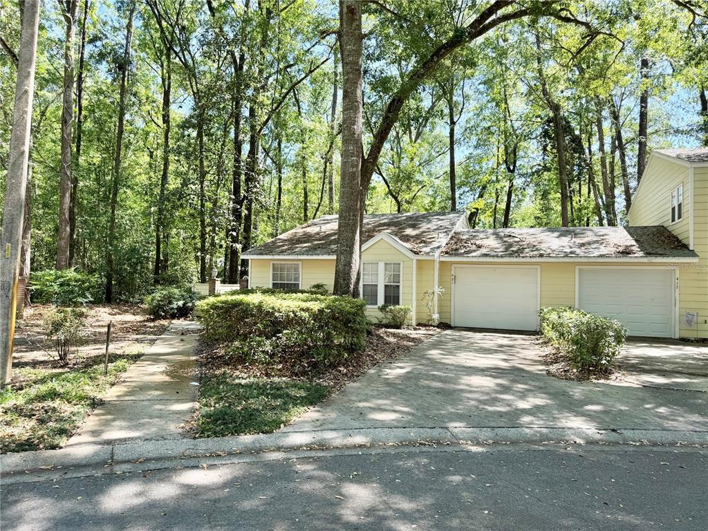 421 Northwest 48th Boulevard Gainesville, FL 32607 - Photo 26 of 26 a front view of a house with a yard