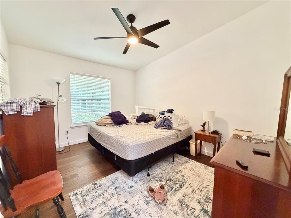 421 Northwest 48th Boulevard Gainesville, FL 32607 - Photo 8 of 26 a living room with furniture and a large window