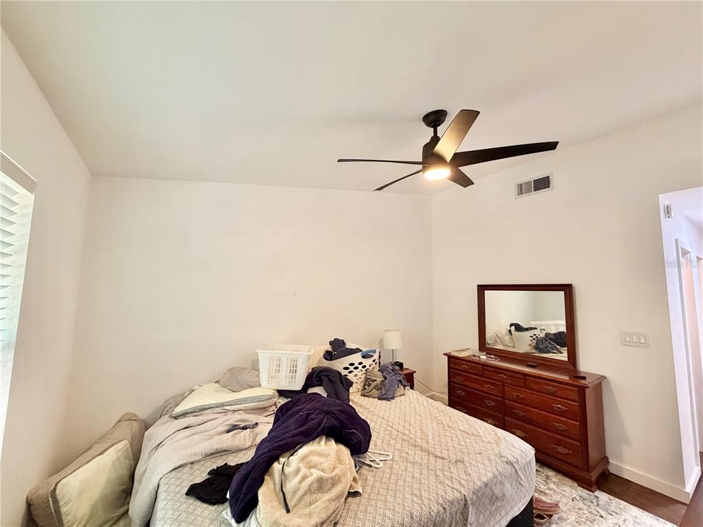 421 Northwest 48th Boulevard Gainesville, FL 32607 - Photo 9 of 26 a bed room with a bed and a window