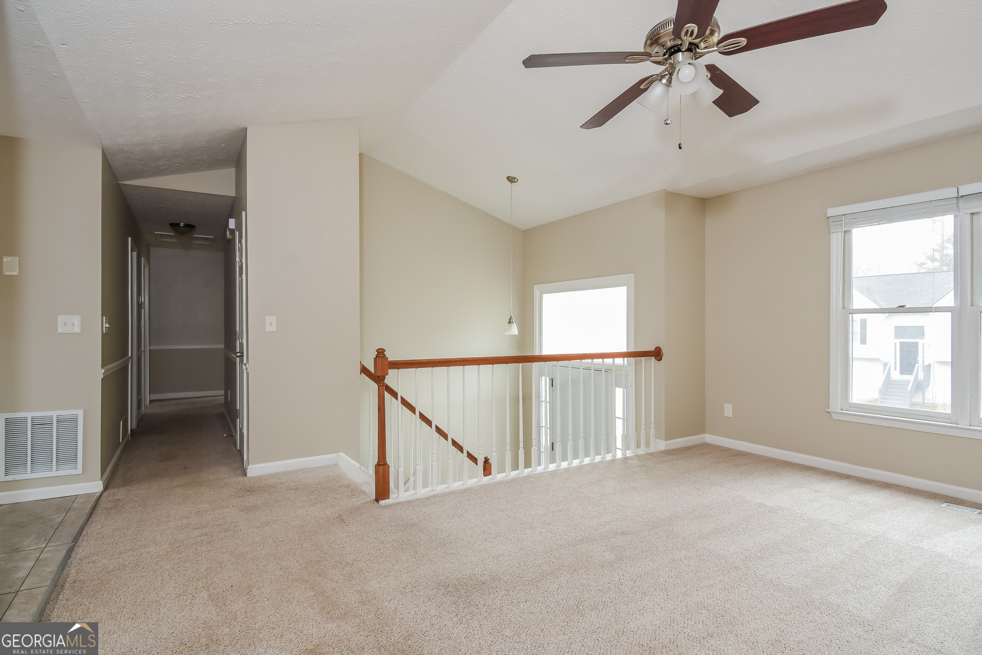 162 Aztec Way Southeast Acworth, GA 30102 - Photo 2 of 17 a view of an empty room with a window