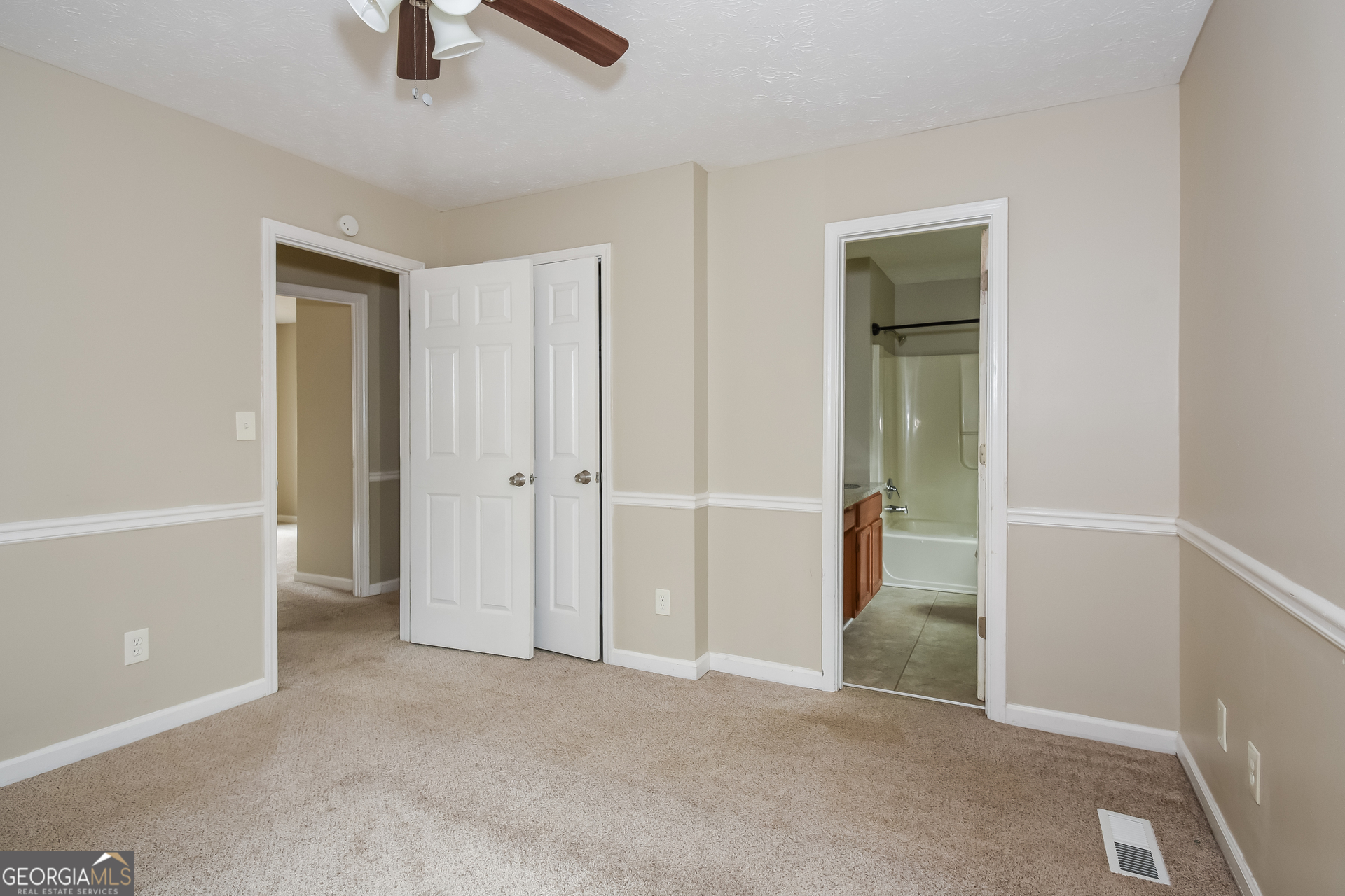 162 Aztec Way Southeast Acworth, GA 30102 - Photo 9 of 17 an empty room with closet and windows