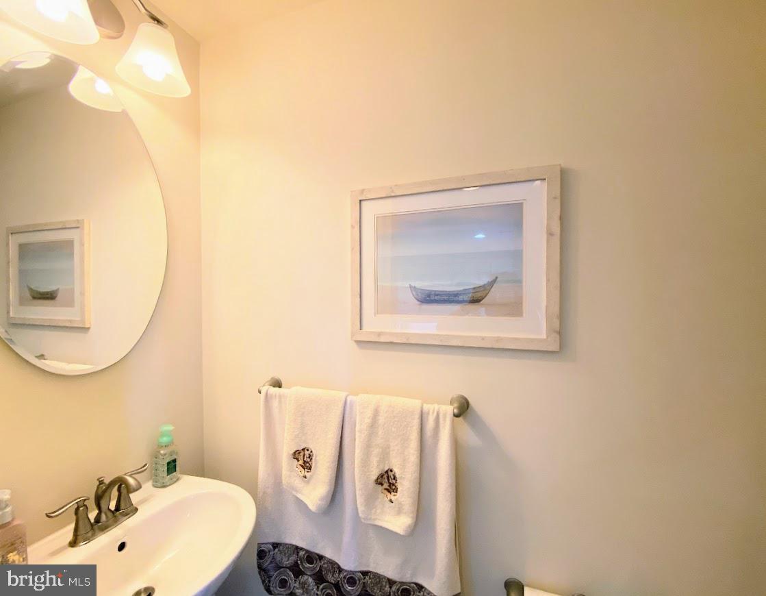 203 Quarry Point Road Malvern, PA 19355 - Photo 6 of 23 a bathroom with a sink mirror and toilet