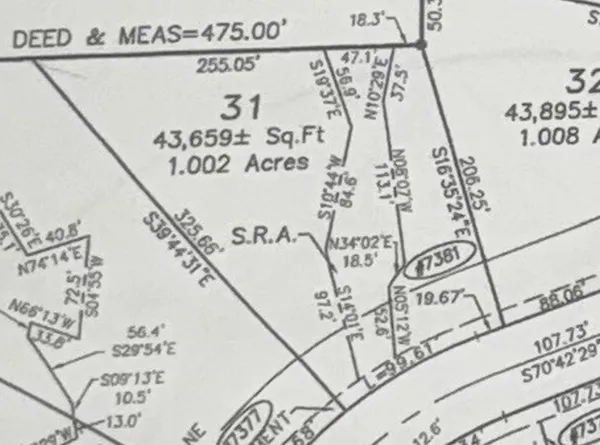 a close up of a sign on a shelf