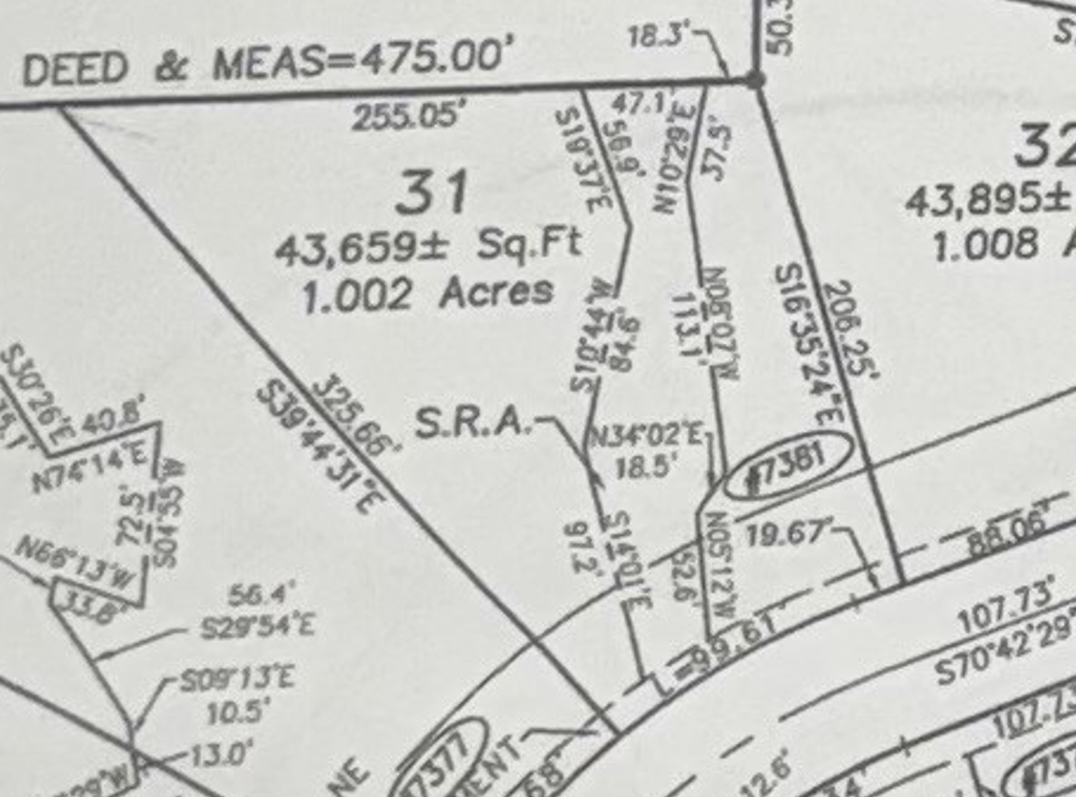 7381 English Oak Lane Spring Grove, IL 60081 - Photo 2 of 6 a close up of a sign on a shelf