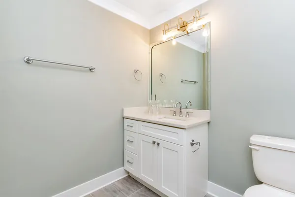 a bathroom with a bathtub and a toilet