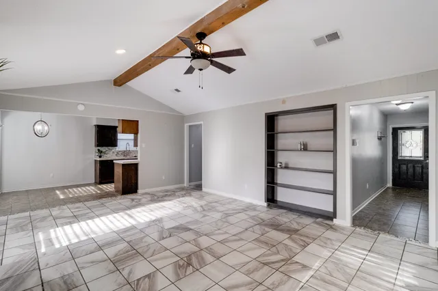 a view of a livingroom with a staircase