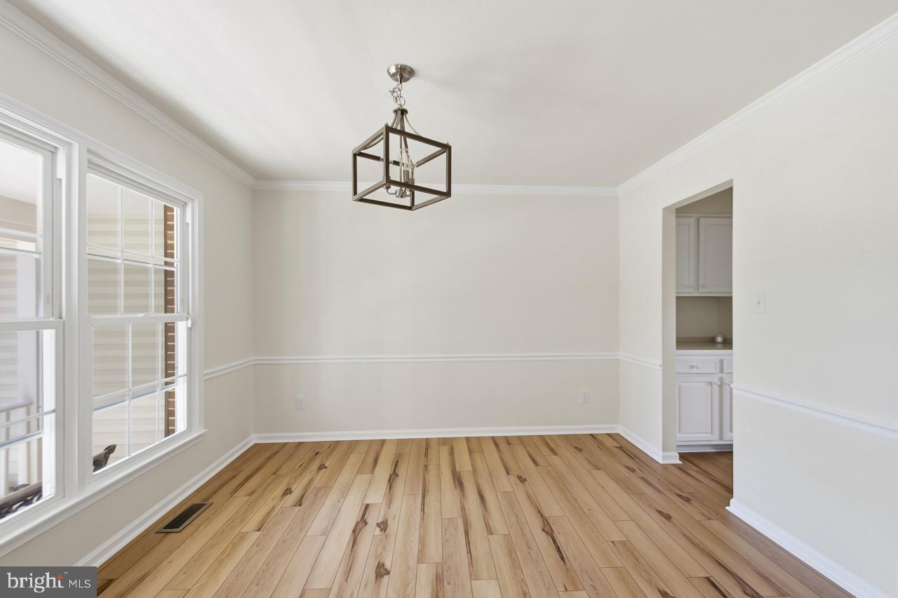 7100 Counter Place Burke, VA 22015 - Photo 18 of 54 Dining room with butler’s pantry