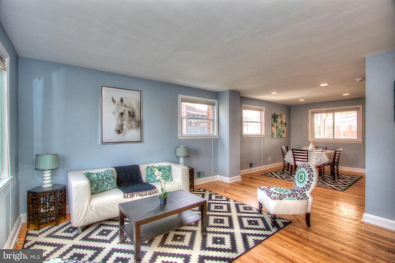 1261 Deanwood Road Baltimore, MD 21234 - Photo 1 of 22 a living room with furniture and wooden floor