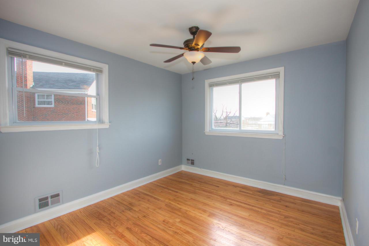 1261 Deanwood Road Baltimore, MD 21234 - Photo 13 of 22 a view of an empty room with a window