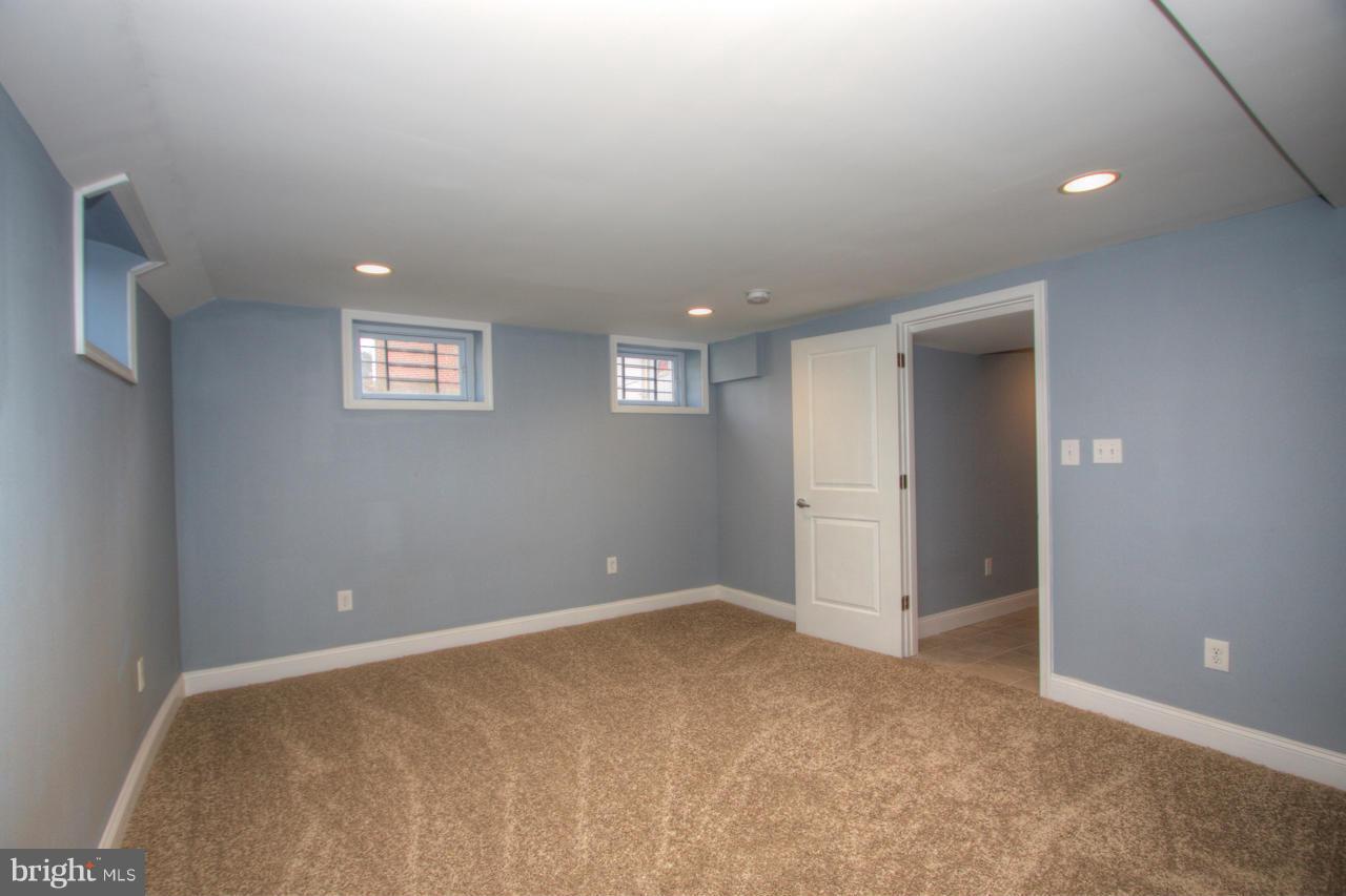 1261 Deanwood Road Baltimore, MD 21234 - Photo 15 of 22 an empty room with windows