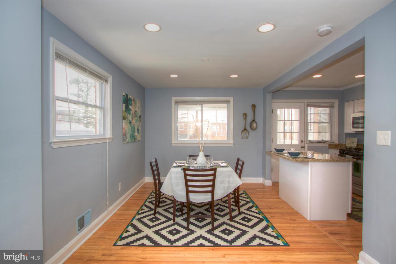1261 Deanwood Road Baltimore, MD 21234 - Photo 3 of 22 a living room with a couch and window