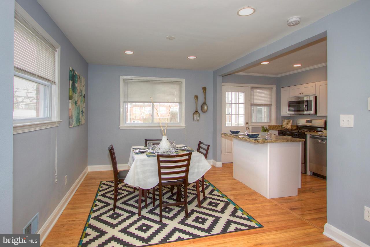 1261 Deanwood Road Baltimore, MD 21234 - Photo 5 of 22 a living room with a couch and wooden floor
