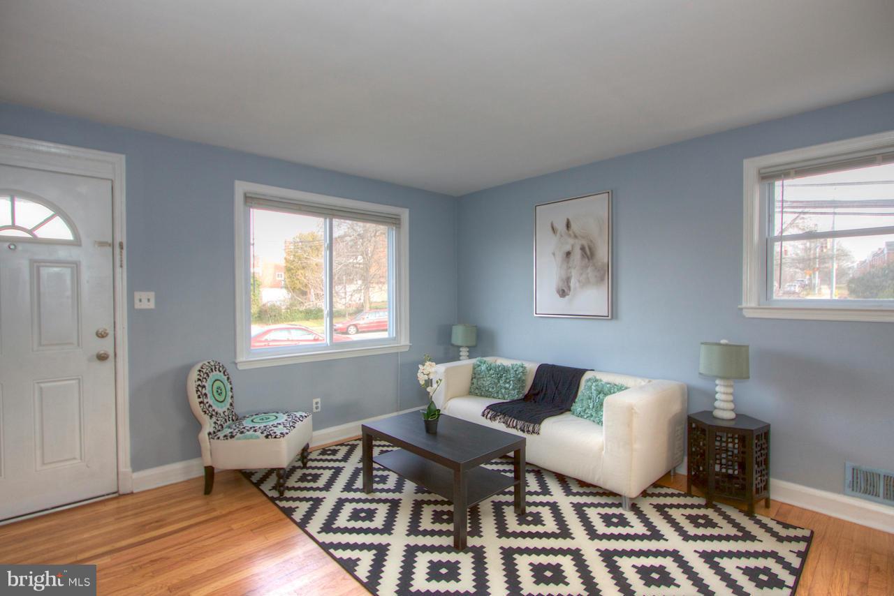 1261 Deanwood Road Baltimore, MD 21234 - Photo 7 of 22 a living room with furniture and a window