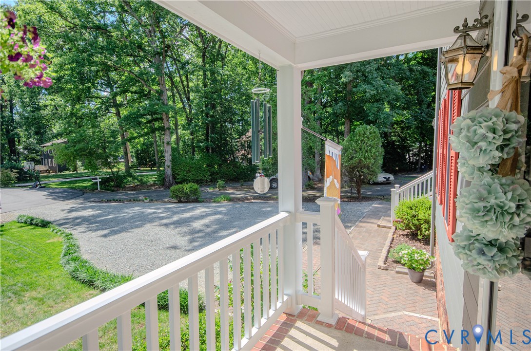 12500 Musical Lane Midlothian, VA 23113 - Photo 3 of 51 Covered front porch featuring white railing, brick