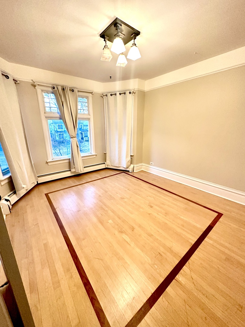 1241 Maple Avenue Wilmette, IL 60091 - Photo 11 of 13 a view of an empty room with a window