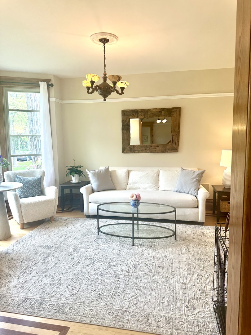 1241 Maple Avenue Wilmette, IL 60091 - Photo 3 of 13 a living room with furniture and a flat screen tv
