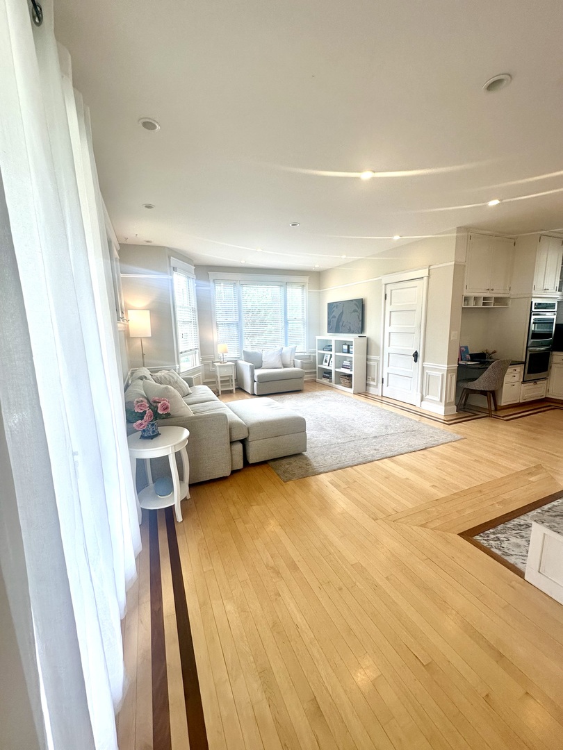 1241 Maple Avenue Wilmette, IL 60091 - Photo 6 of 13 a living room with furniture and a large window
