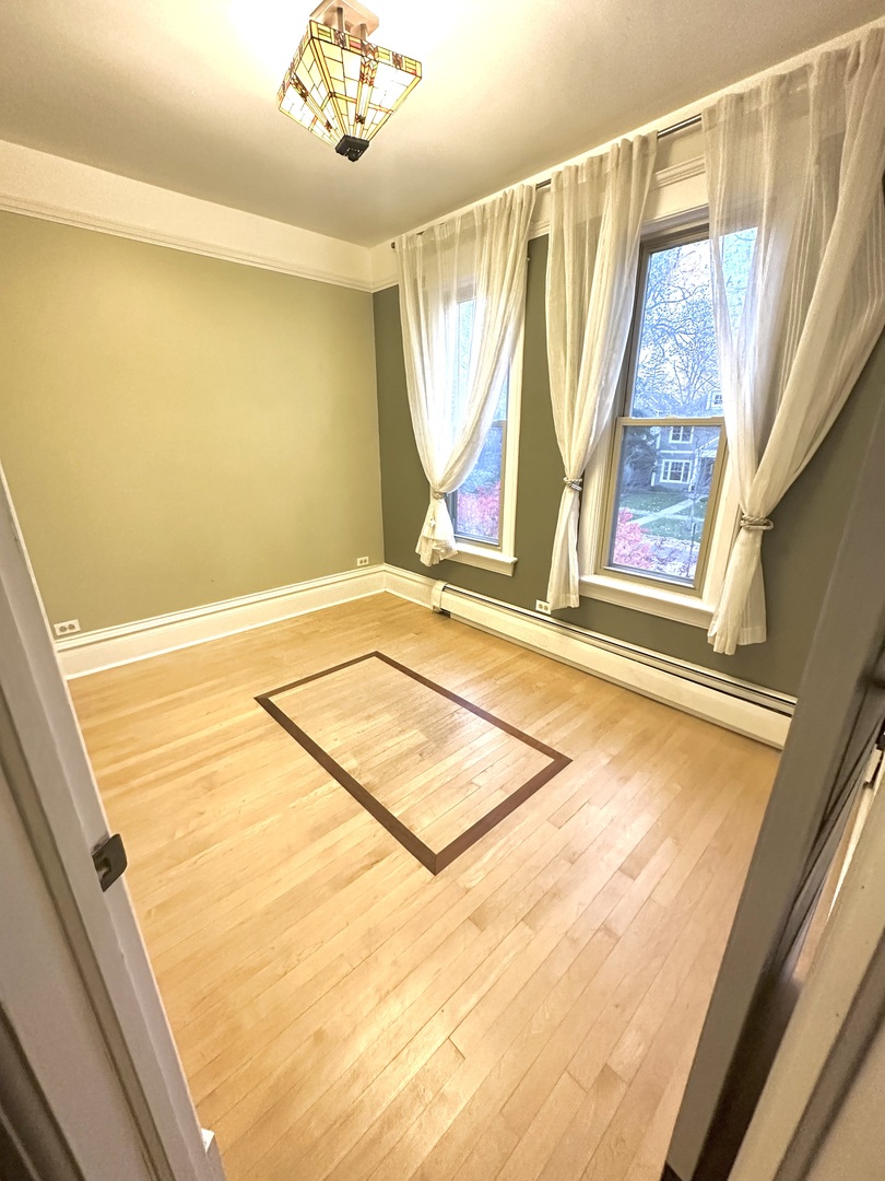 1241 Maple Avenue Wilmette, IL 60091 - Photo 10 of 13 a view of an empty room with windows
