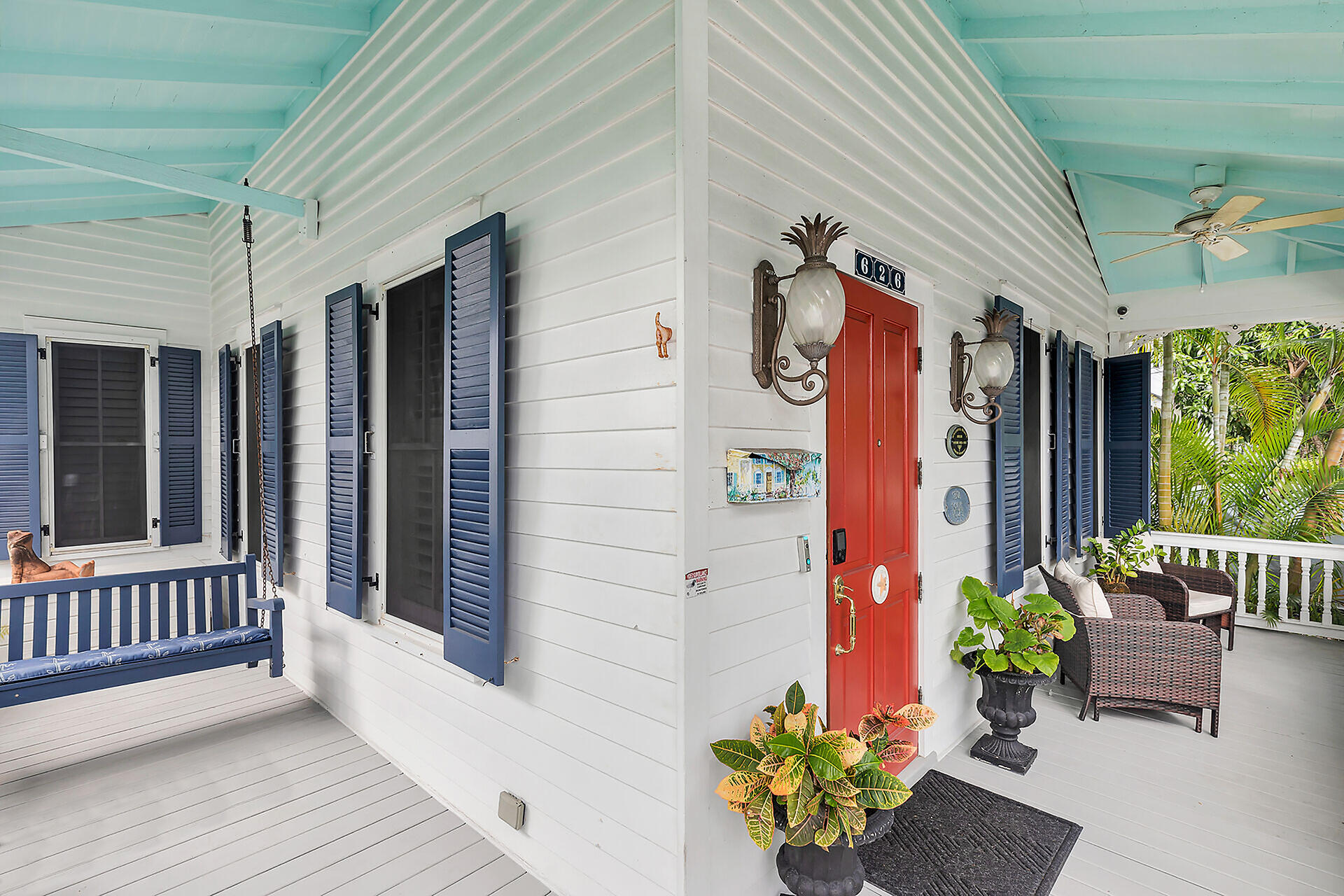 626 Grinnell Street Key West, FL 33040 - Photo 2 of 40 a view of a chairs and table in a patio